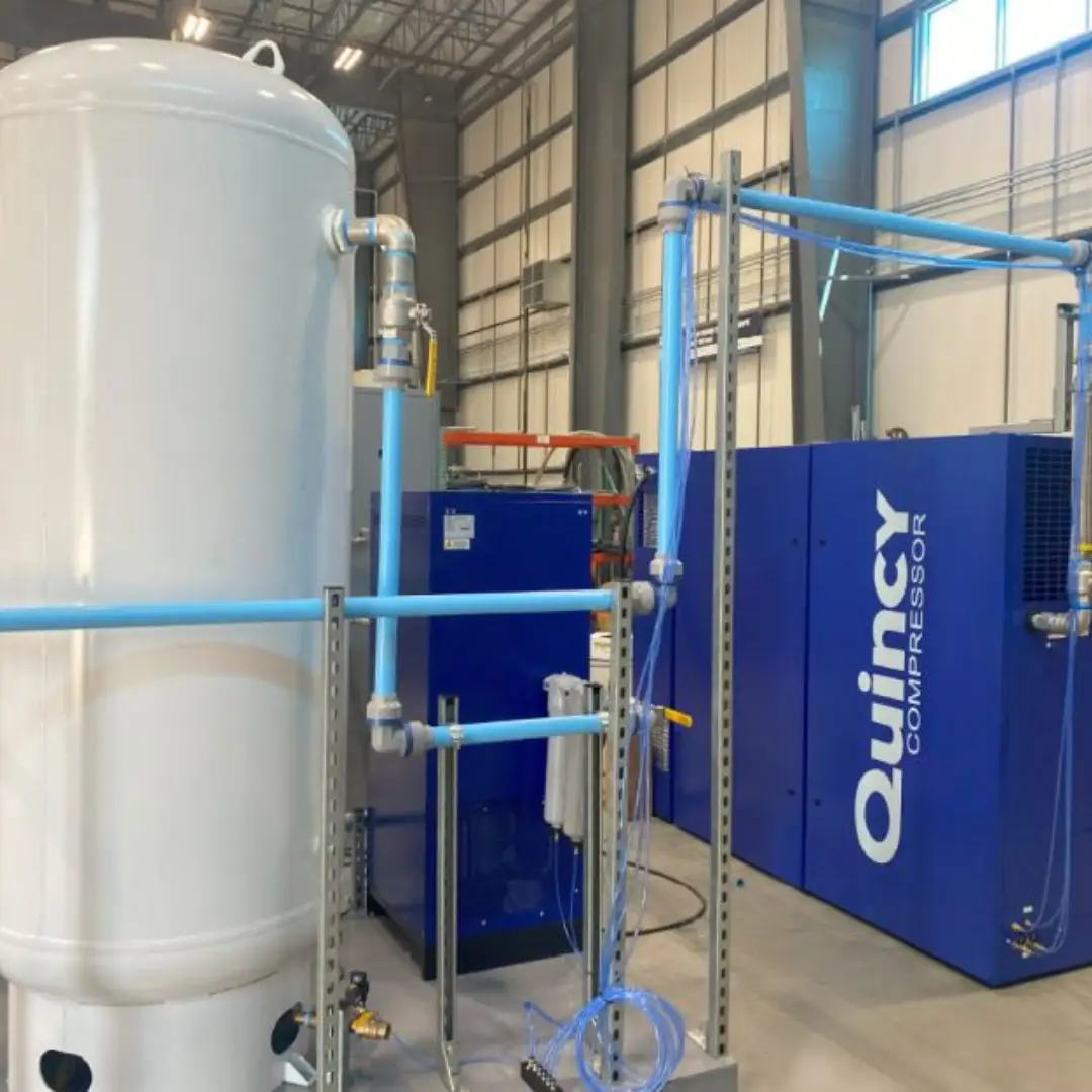 Skid packaged compressed air system for manufacturing facility spotlighting AST piping systems